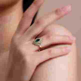 Marquise Cut Emerald And Diamond 1.63ct Ring